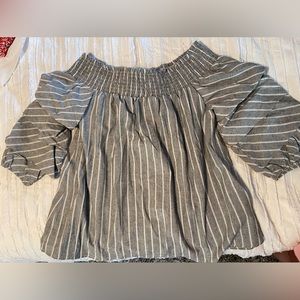 Off the shoulder top, 3/4 tiered sleeves with an adorable bow in the back.